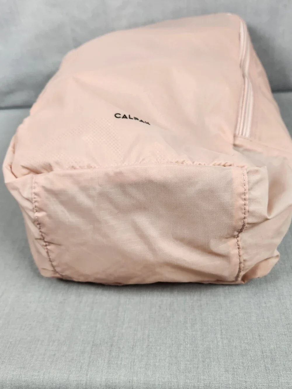 Calpak shoe cube bag with inside pocket, zipper closure carrying strap Mauve